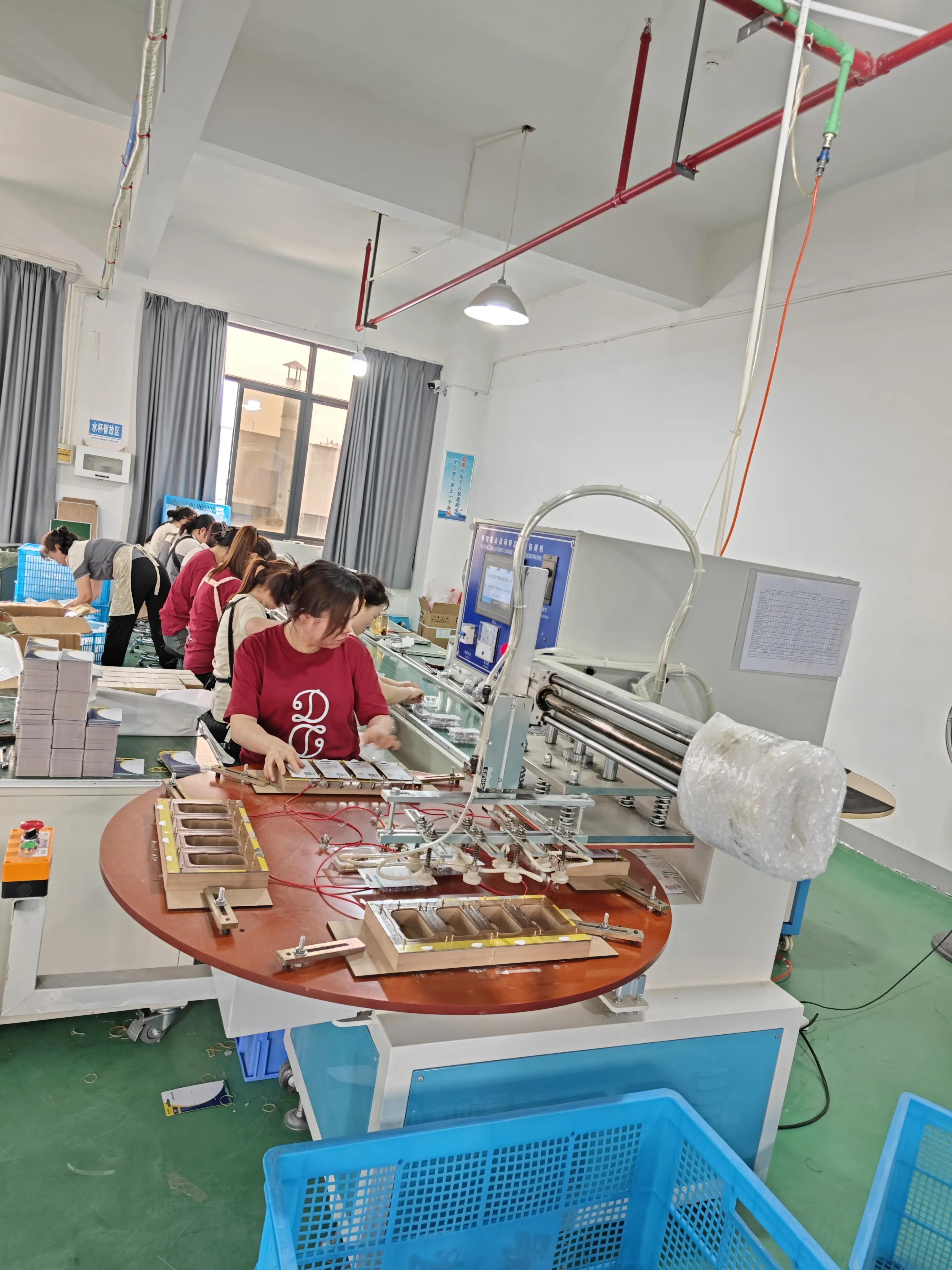 Dongzheng worker operating sewing product production equipment